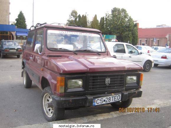 cu acest zecar m-am si plimbat, motorul trage cam greu...e cam obosit. poze cu aro 10